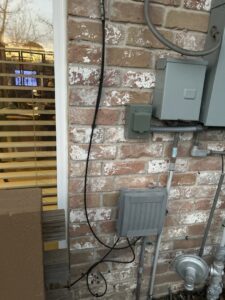 A detailed view of a residential circuit breaker panel, demonstrating professional electrical work by Volt-Pro Electric, LLC in Houston, TX