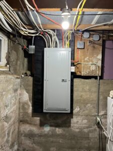 A residential electrical breaker panel with organized wiring installed by Josh LaFerriere Electric in Westbrook, ME.