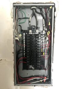 A residential electrical breaker panel with wiring installed by T-Volt, Inc. Electrical Contractor in Fort Lauderdale, FL.