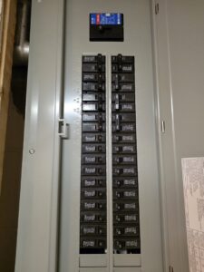 Residential electrical breaker panel with circuit breakers installed by TF Electrical Solutions in Omaha, NE.
