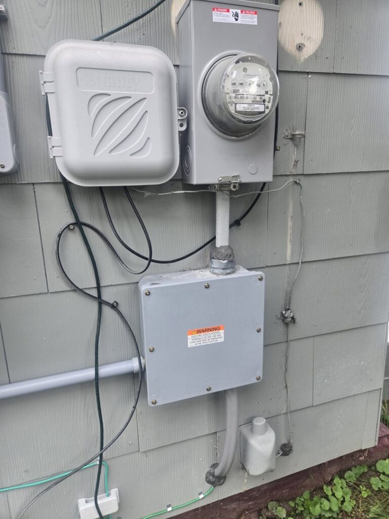 A residential electrical meter and conduit installation by 2 Live Wires in Slatington, PA.