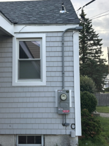 Residential electrical meter and service entrance installed by KG Electric LLC in Cumberland, RI