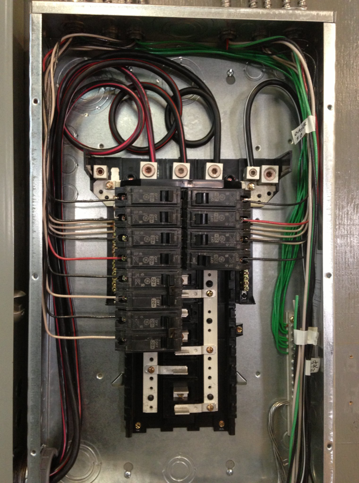 A residential electrical panel with wiring and circuit breakers installed by All City Electrical in Orlando, FL