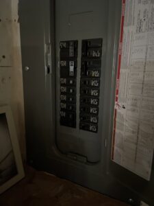 A residential electrical panel with circuit breakers, showcasing installation work by Esmeralized Electric in San Jose, CA.