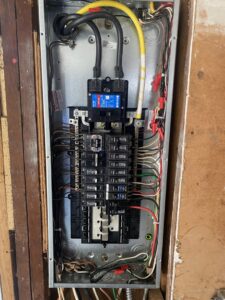 A residential electrical panel installation with organized wiring by Kot Electric LLC in Kent, WA.