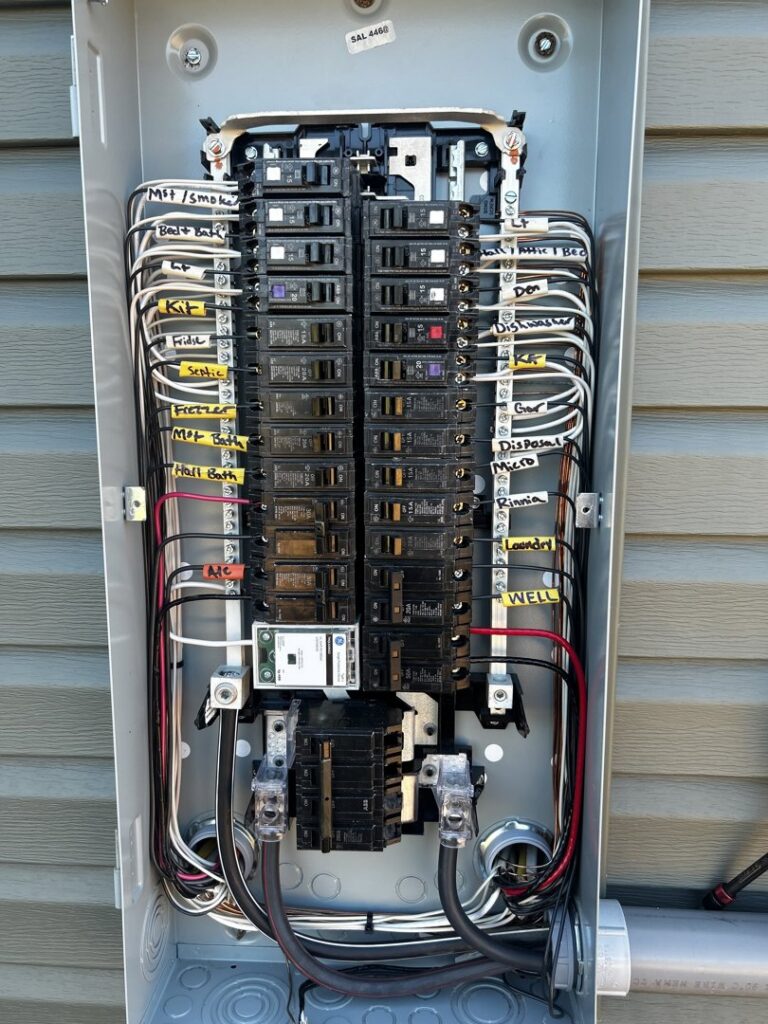 A neatly wired residential electrical panel with labeled breakers installed by Prime Time Electric in Rock Hill, SC.