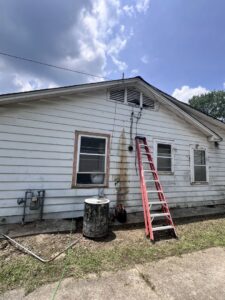 Residential electrical panel upgrade with a ladder indicating work by Nelson Electric, Inc. in Hot Springs, AR.
