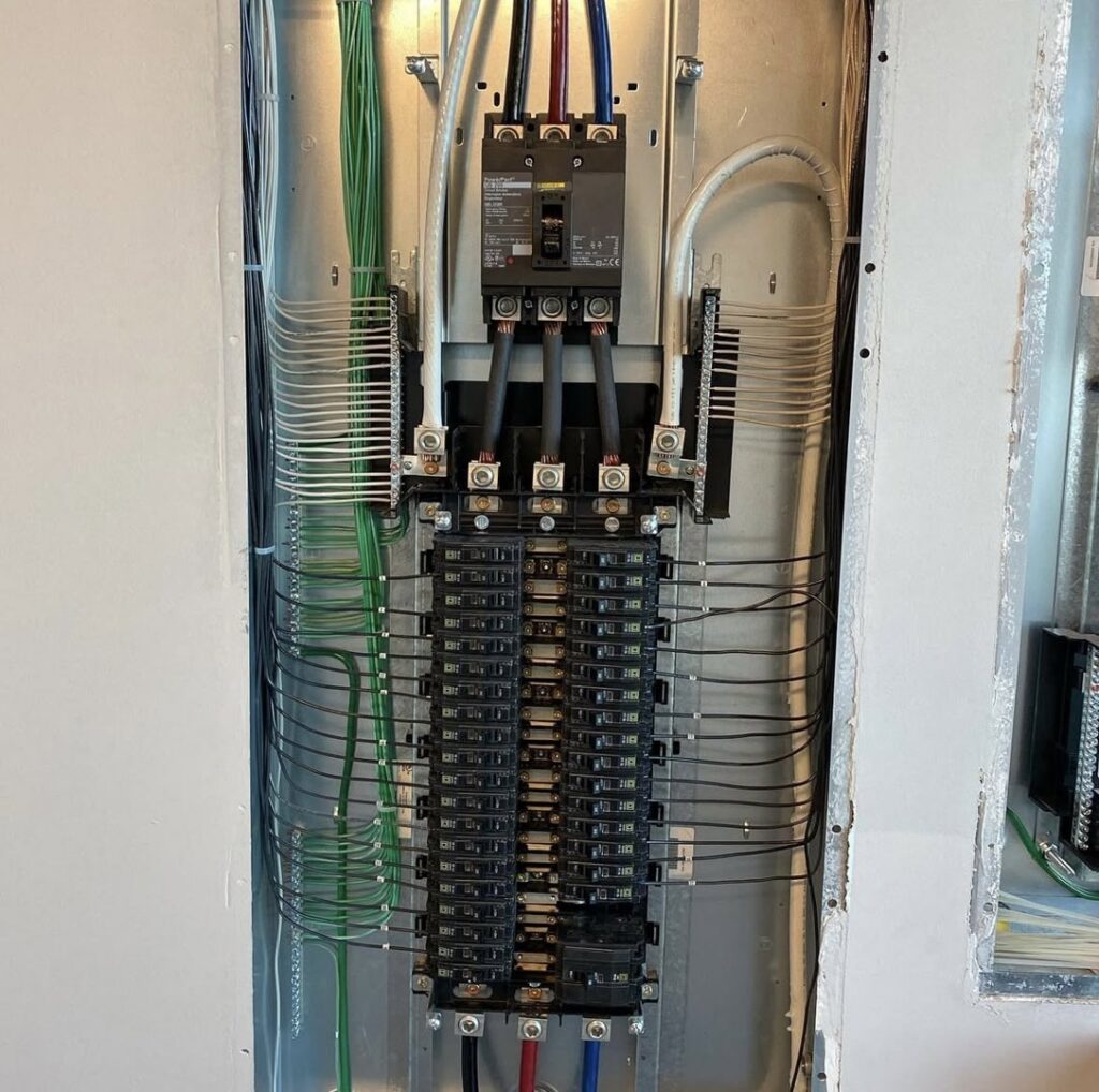 An open residential electrical panel during an upgrade by North Springs Electric Company in Sandy Springs, GA.