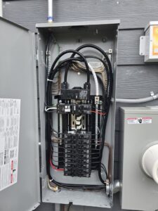 Residential electrical panel with organized wiring and circuit breakers by Access Electrical in Indianapolis, IN.