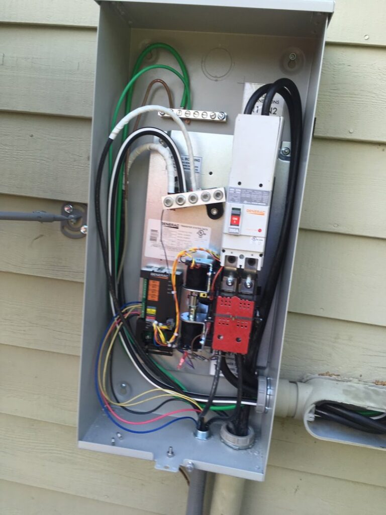 An open residential electrical panel showing wiring and circuit breakers, installed or serviced by ACI Northwest Heating, Cooling & Electrical in Dalton Gardens, ID.