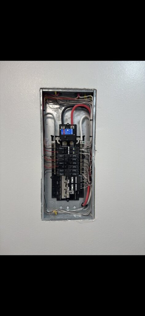 A residential electrical panel with neatly organized wiring, installed by Delta Current Electric in Jonesboro, AR.