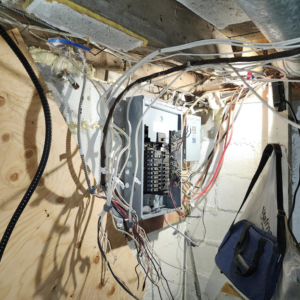 Complex residential electrical wiring connected to an open panel, demonstrating work by SEL Electric in Truro, NS.