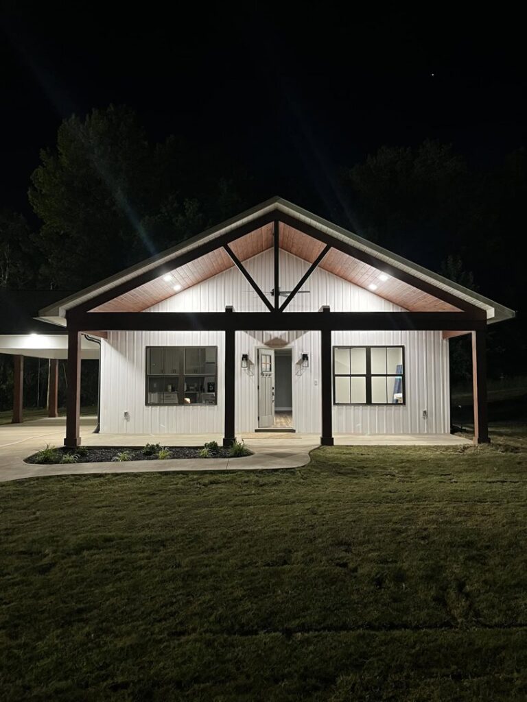 Residential exterior lighting installation showcasing a beautifully lit home by Spencer Electric in Hopkins, MN.