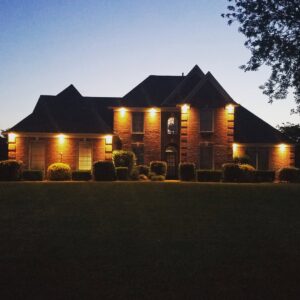 Residential exterior lighting installation on a brick home by Superior Electric and Lighting LLC in Southaven, MS
