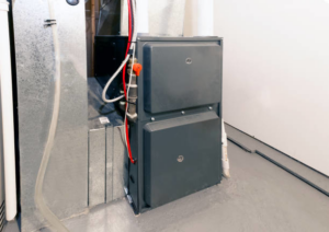 A residential furnace and HVAC system installed in a utility area by Team Mechanical, Inc in Minneapolis, MN.