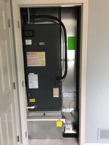 A residential furnace and air handler unit installed in a closet by All Systems LLC in Fremont, NE