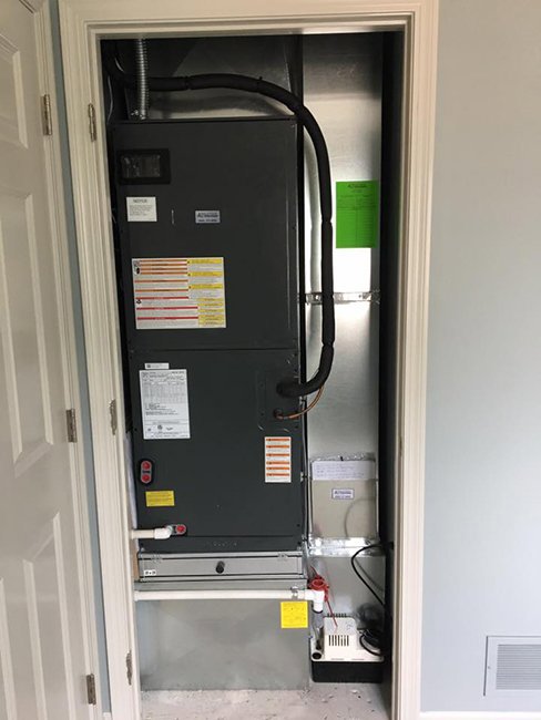 A residential furnace and air handler unit installed in a closet by All Systems LLC in Fremont, NE