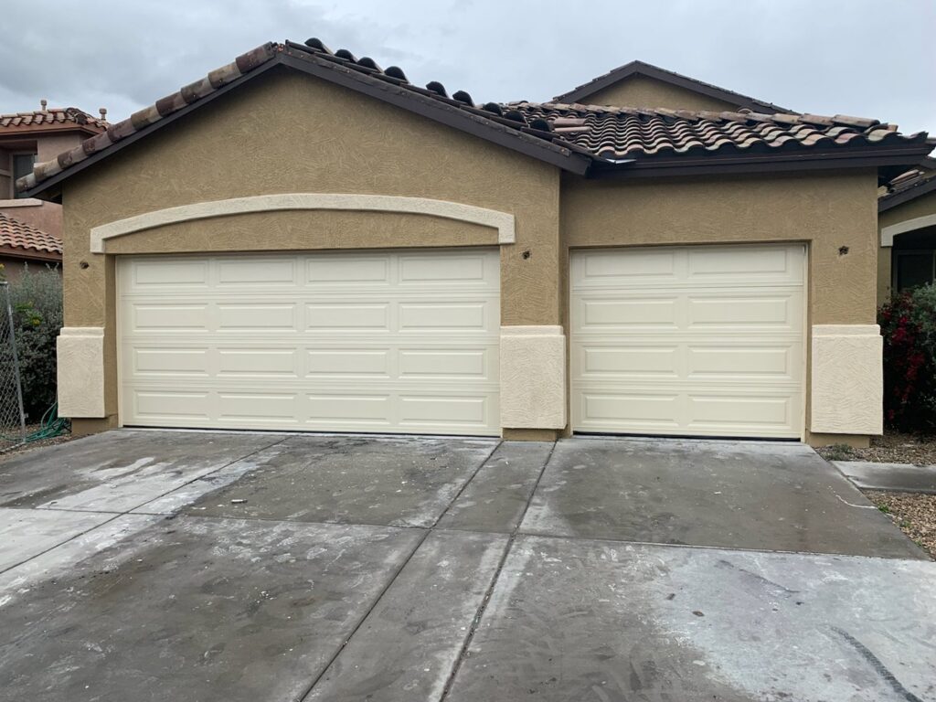 Two newly installed residential garage doors by Morning Star Garage Doors in Phoenix, AZ