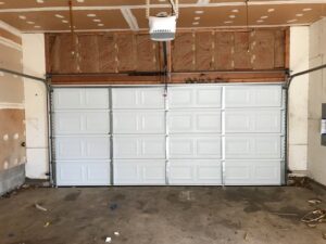 An interior view of a newly installed residential garage door by Universal Overhead And Garage Doors in Baltimore, MD.