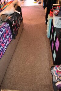 A clean residential hallway carpet with visible vacuum lines after professional service by Green Dragon Carpet & Upholstery Cleaning LLC in Boise, ID.