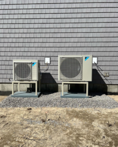 Residential heat pump installation with two outdoor units by CC Mechanical in Portland, ME.