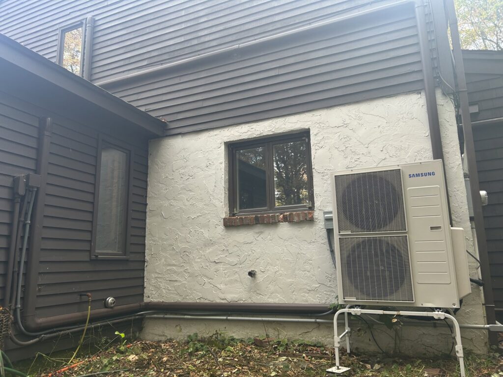 A residential heat pump unit installed on the exterior of a home by Rockys electric in La Junta, CO.