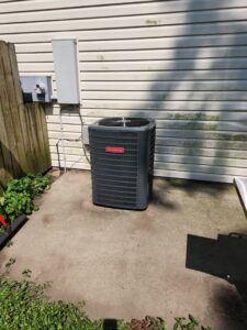 A new Goodman residential HVAC condenser unit installed by Borte Mechanical Services LLC in Chesapeake, VA