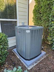 A newly installed or well-maintained residential HVAC condenser unit by Modern Mechanical HVAC in Garner, NC.