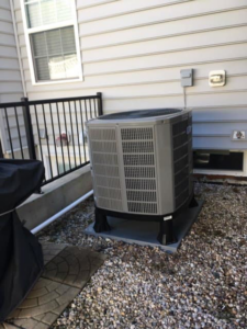 A residential HVAC condenser unit serviced or installed by James HVAC LLC in Georgetown, DE.
