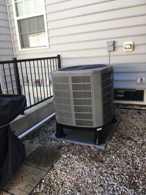 A residential HVAC condenser unit serviced or installed by James HVAC LLC in Georgetown, DE.