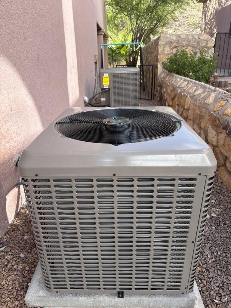 Two residential HVAC condenser units installed outside a home, serviced by Anchor Air in El Paso, TX