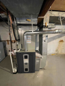 A residential HVAC furnace system with connected ductwork installed by Air Docs Inc. in Vero Beach, FL