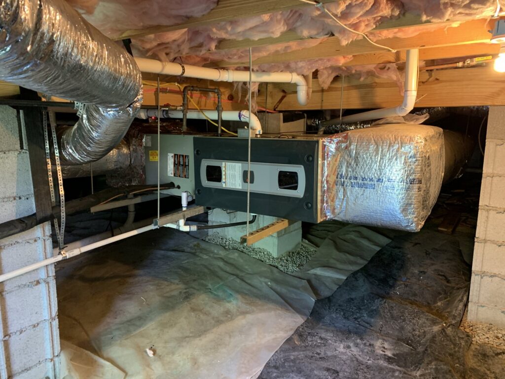 Multiple outdoor HVAC units and a home generator installed at a residential property by Breeze Heating & Cooling Nashville in Nolensville, TN.