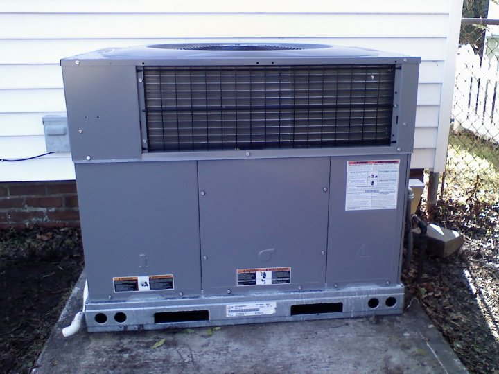 A residential outdoor HVAC system unit installed by Collis Mechanical Services in Norfolk, VA