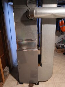A residential HVAC system with a furnace and ductwork, installed by Lyons Heating and Cooling in Lyons, OR.