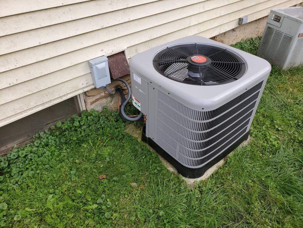A residential outdoor air conditioning unit serviced by Absolute HVAC in Wilmington, DE.