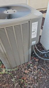 A residential outdoor air conditioning unit, ready for service or maintenance by Ecology Air Innovations in Sacramento, CA.