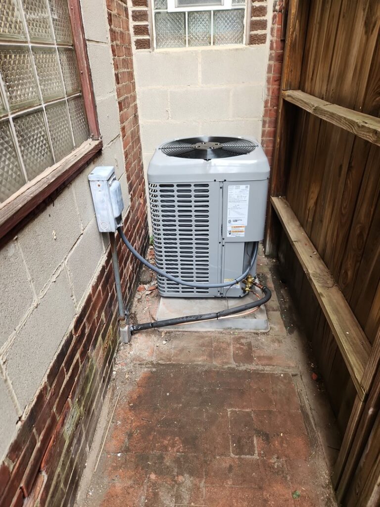 A newly installed residential outdoor air conditioning unit, a typical service provided by HVAC Philly in Feasterville, PA.