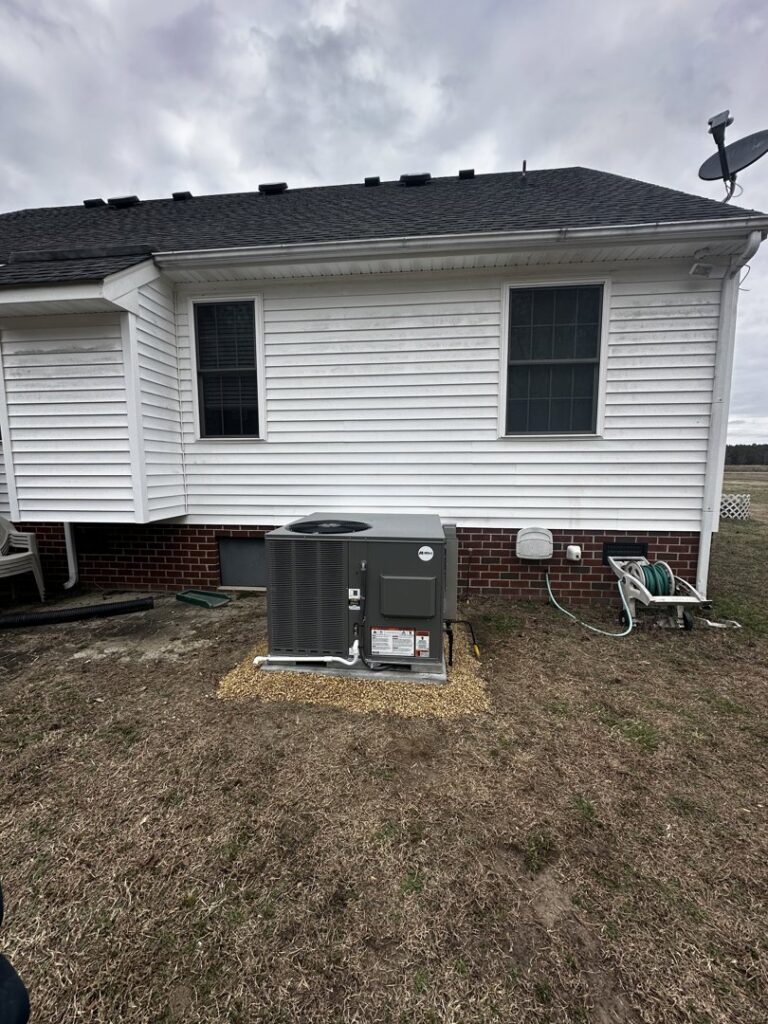A residential outdoor air conditioning unit installed by Miller's Home Comfort-Chesapeake in Chesapeake, VA.