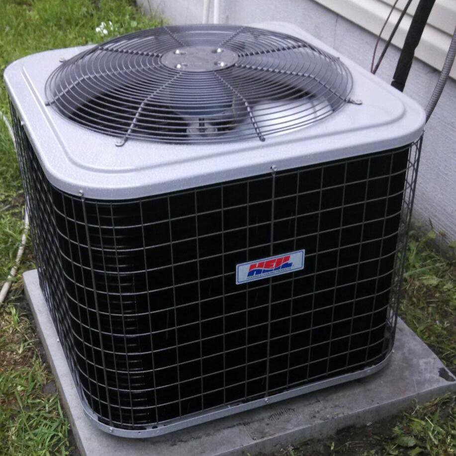 A residential outdoor air conditioning unit installed by Turner & Son's Heating and Air in Anderson, IN