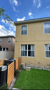 Outdoor air conditioning units installed at a residential property by New Standard Air Conditioning Cool & Heat LLC in Winter Springs, FL.