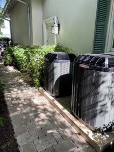 Two residential outdoor air conditioning units installed by T&D Air Conditioning in Fort Lauderdale, FL.