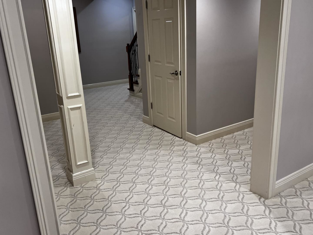 A residential hallway with freshly installed patterned carpet by Kevin's Carpets of Lexington and Georgetown, KY.