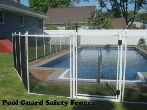 A residential pool secured with a black mesh safety fence, showcasing work by Pool Guard in North Charleston, SC.