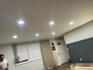 A residential room showcasing new recessed lighting installation by Jimenez Electric Inc in Denver, CO.