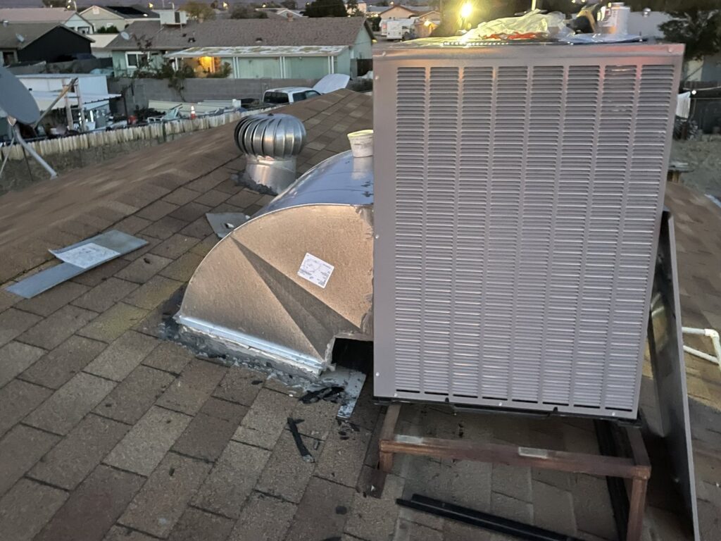 A residential rooftop HVAC unit and associated ductwork installed by LEWIS AIR LLC in Mesa, AZ.