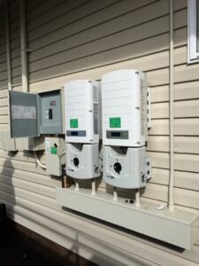 Residential solar inverter and electrical panel setup by Big Island Electric & Solar in Hilo, HI