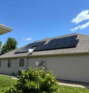 Residential solar panels installed on a rooftop by Edelman Heating, Cooling, Plumbing, Electric & Solar in Fairbury, IL.
