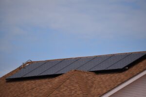 Residential solar panel installation on a roof by True Light Electric in Albuquerque, NM.