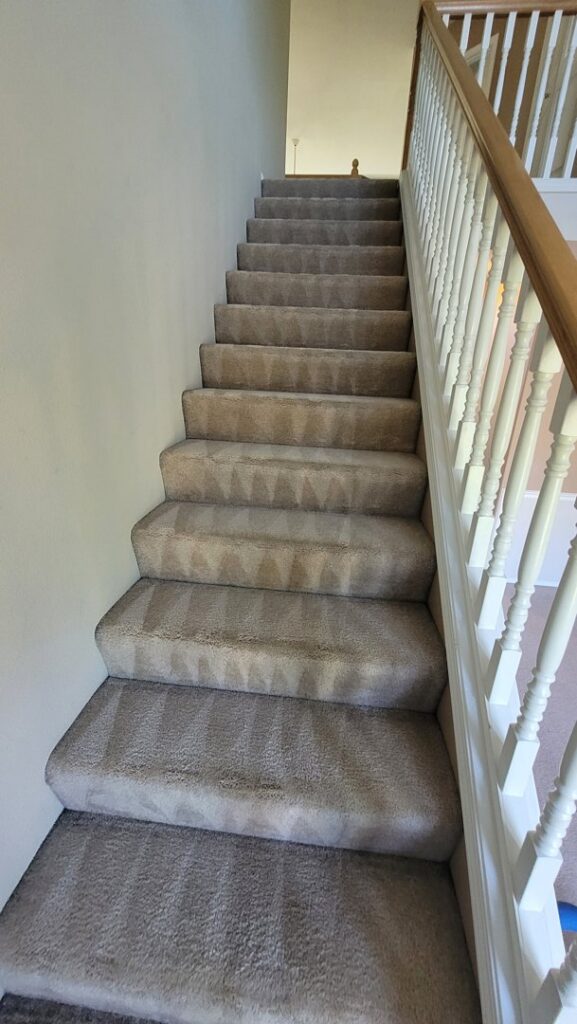 Professional cleaning of a residential carpeted staircase by PDX STAR in Happy Valley, OR